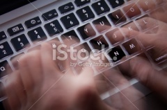 stock-photo-11689642-typing-motion-blurred